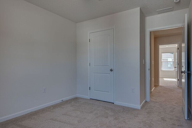 Building Photo - 6473 Flora Court