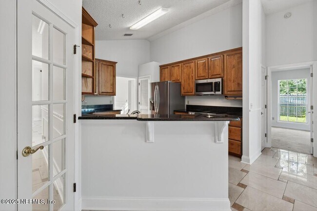 Building Photo - 4851 Jaybird Cir N