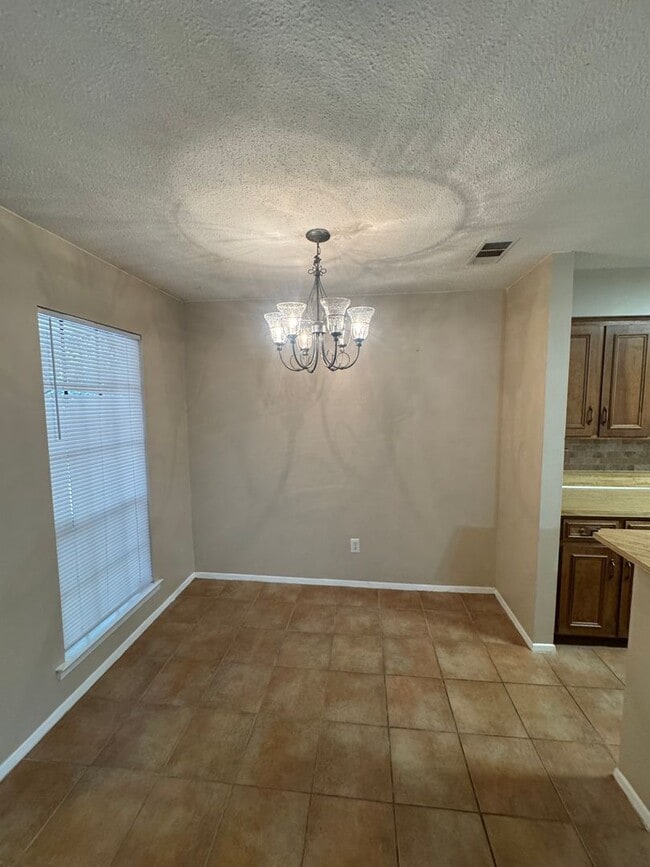 Building Photo - Corner Unit and One Level