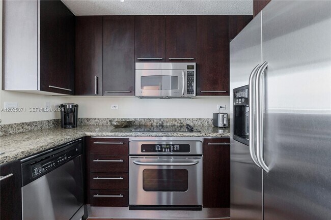 Building Photo - 6515 Collins Ave