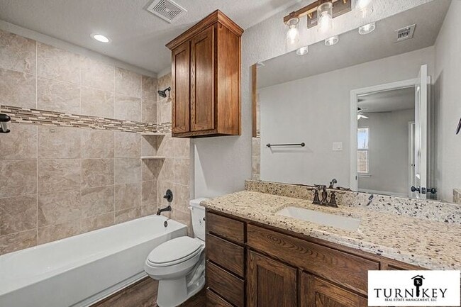 Building Photo - COMING SOON! 3BD/2BA Energy-Efficient Duplex | Granite | Island Kitchen | Garage | Yard Care Incl...