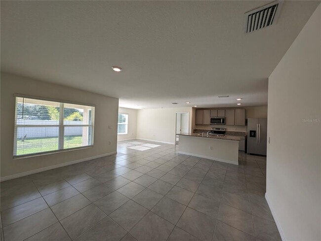 Building Photo - 8661 Triumph Cir