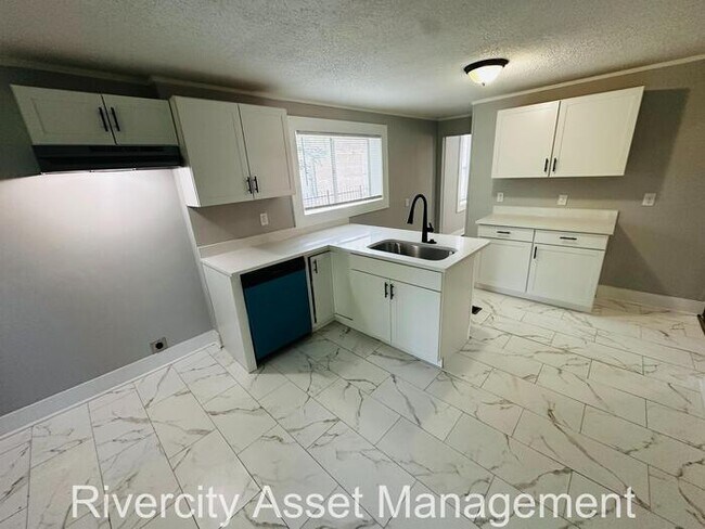 Building Photo - Move-In Ready! Stunning 4-Bedroom, 2-Bath ...