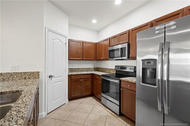 Building Photo - 9512 SW Merlin Ct