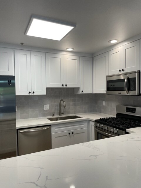 Building Photo - 4477 Woodman Ave