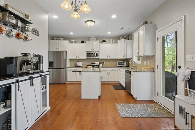 Building Photo - 852 Micahs Way N