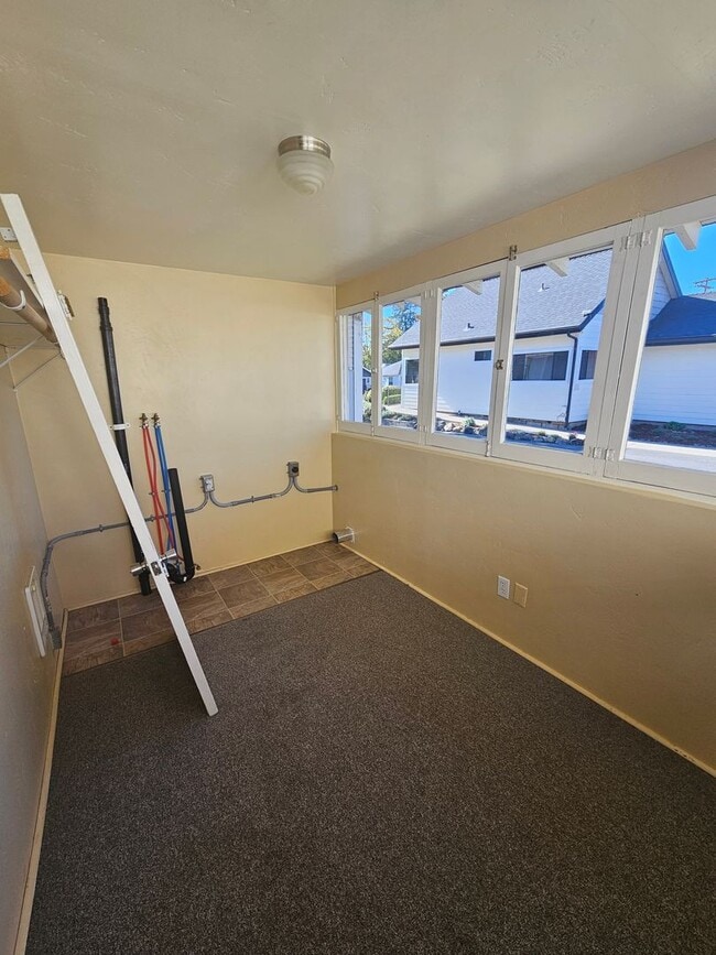 Building Photo - 1/2 OFF FIRST MONTH'S RENT! Charming 2 Bedroom with Bonus/Laundry Room