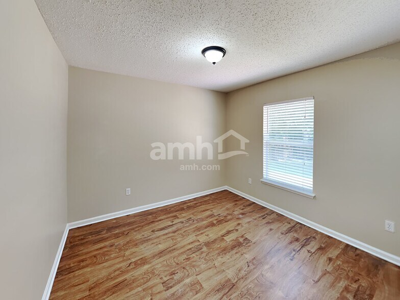 Building Photo - 6815 Rapid River Dr