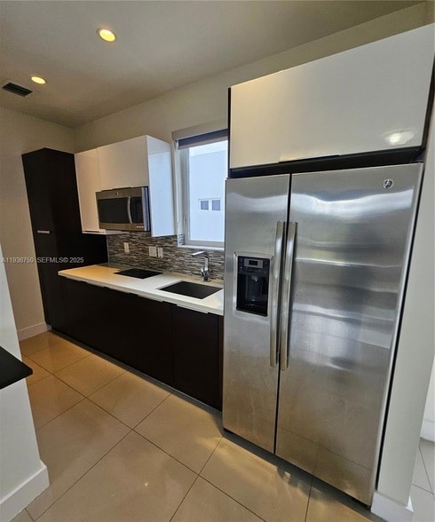 Building Photo - 6410 NW 105th Pl