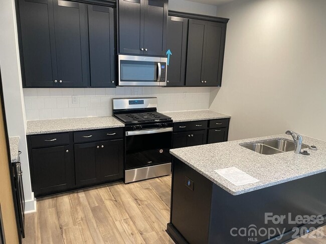 Building Photo - 9547 Munsing Dr