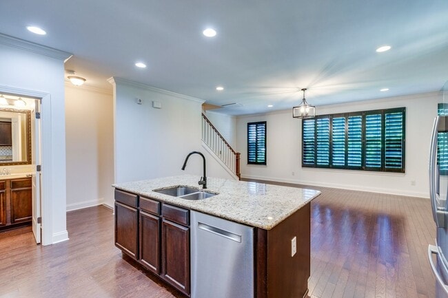 Building Photo - Welcome to this charming end unit townhome