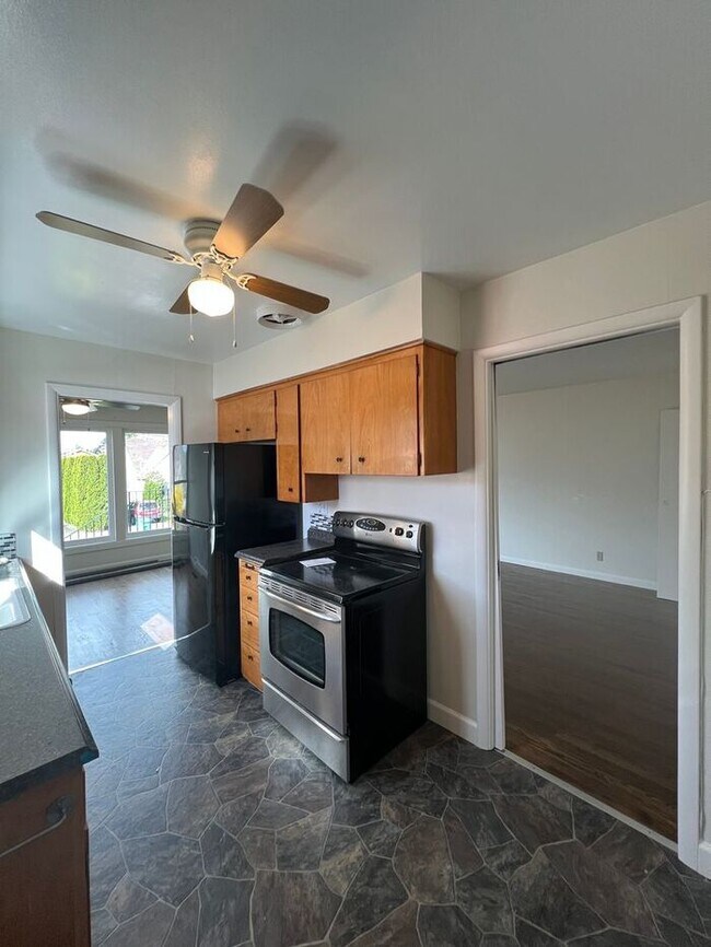 Building Photo - Sun-Drenched Mt. Tabor Home with Massive Yard & Oversized Shop-Garage!