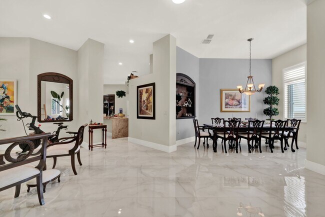 Building Photo - Elegant 4-Bedroom Pool Home in Exclusive G...
