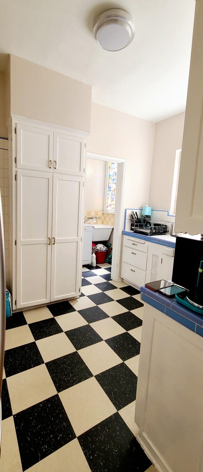 Vintage kitchen with original cabinets and tile - 1003 S Holt Ave