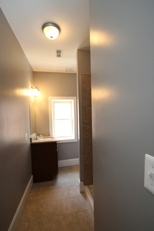 Building Photo - 211 W Lanvale St