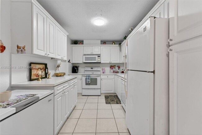 Building Photo - 10777 W Sample Rd