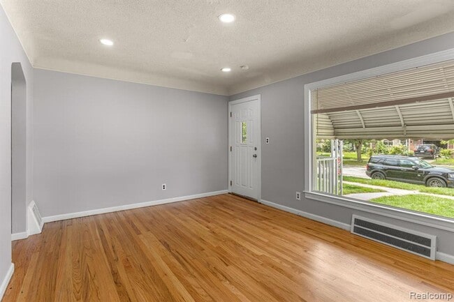 Building Photo - Cozy & Modern: 2-Bed Brick Home with Garage & Finished Basement