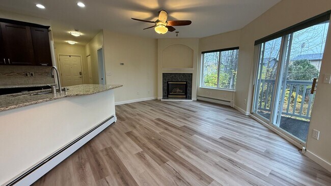 Building Photo - Major Updates! Raised Ranch Style Condo wi...
