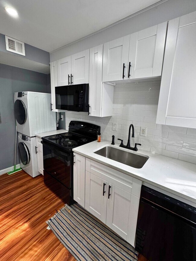 Building Photo - Welcome to your new 2 level TH style apartment home