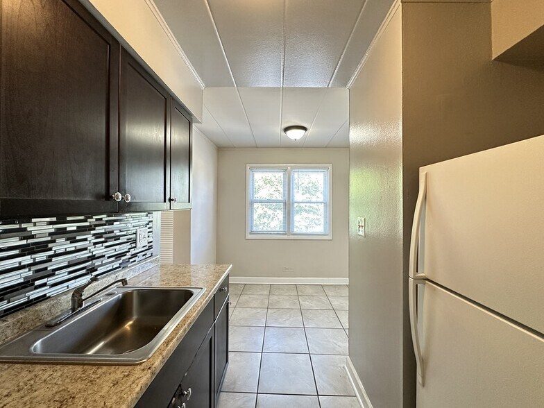 Building Photo - 3820 25th Ave