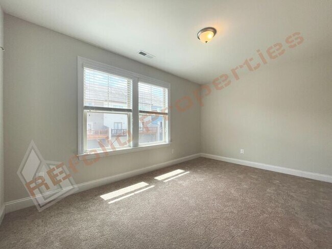Building Photo - Brand New Carpet and Fresh Paint! Charming...
