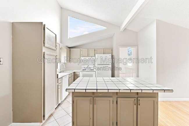 Building Photo - 8917 E Chenango Ave