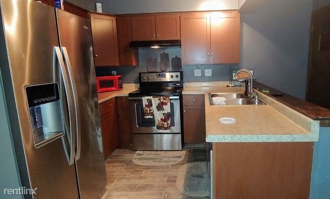 Building Photo - 2 br, 2 bath Townhome - 8329 W Northridge Ct