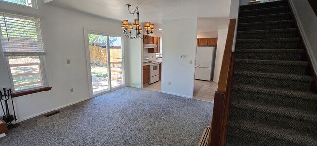 Building Photo - Charming 4-Bed Home in Louisville features bright, open living space, with open deck & garden!