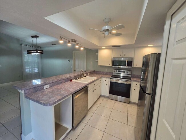Building Photo - "Charming 2-Bed, 2-Bath North Port Retreat with Gleaming Hardwood Floors!"