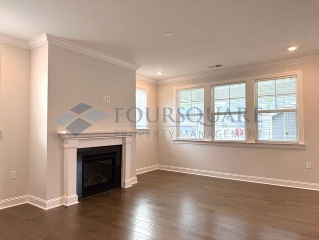 Building Photo - Spacious Corner-Lot Home with Guest Suite, Screened Porch & Detached 2-Car Garage – Resort-Style ...