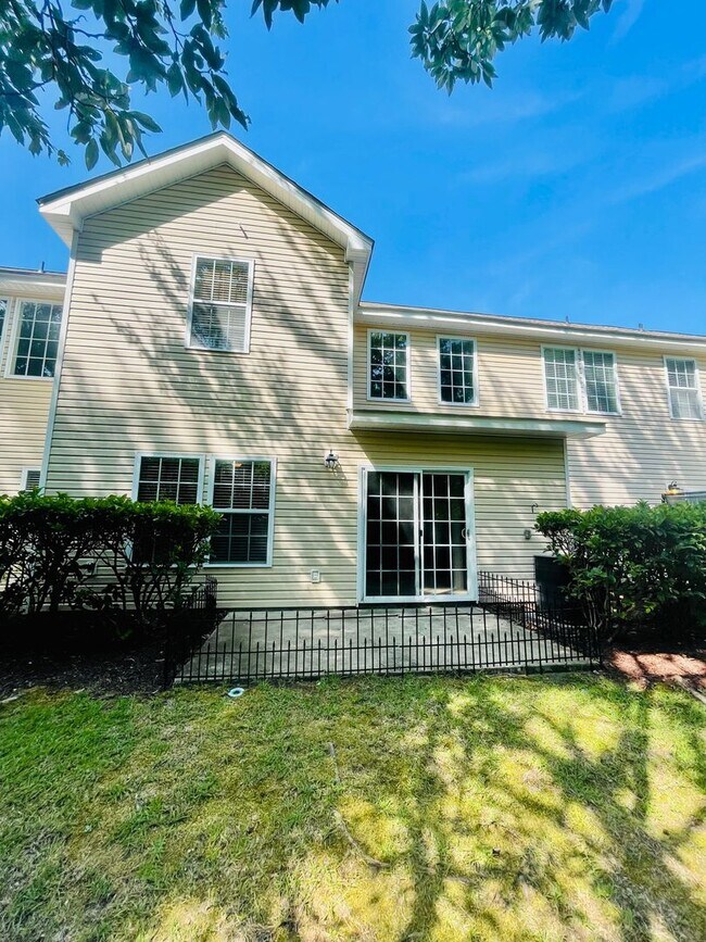 Building Photo - BRAND NEW FLOORING & FRESH PAINT - 3 Bedroom/2.5 Bath Townhome with garage in Wild Wing!
