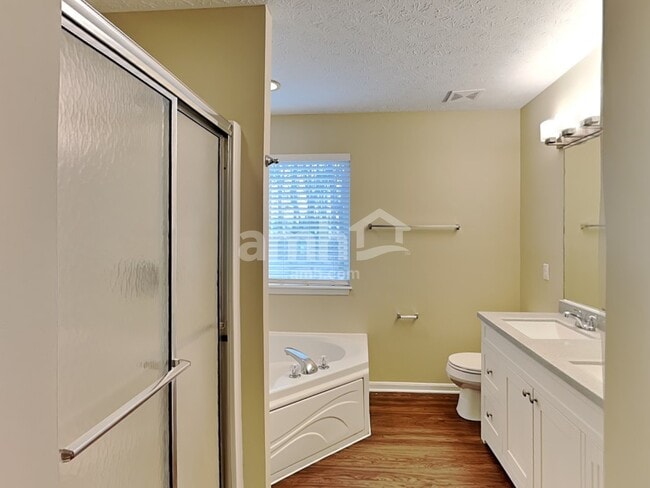 Building Photo - 8685 Woolstone Ct