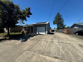 Building Photo - Solar power 3 bedroom 1 bath home with sho...