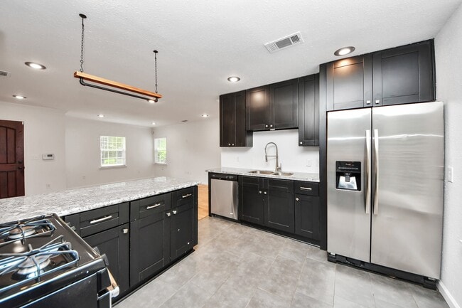 Building Photo - 5118 Ditmas Ln