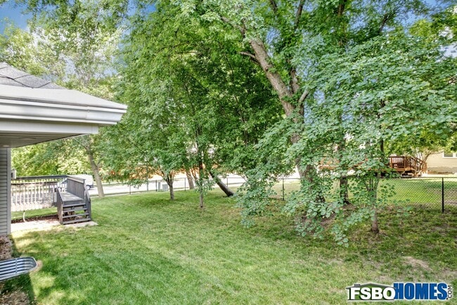 fenced backyard - 14404 Maple Dr