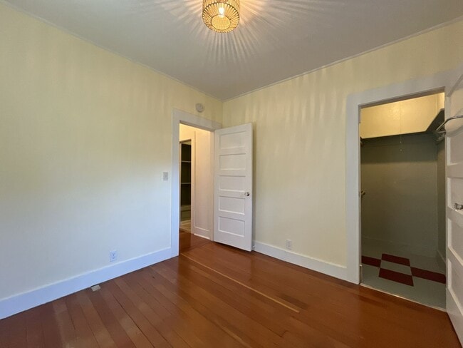Building Photo - Charming Cottage with Hardwood Flooring, Modern Kitchen & Beautiful Outdoor Living Areas