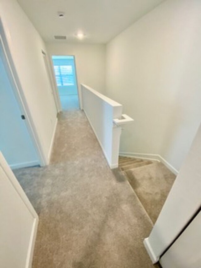 Building Photo - Brand new Townhome centrally located in La...