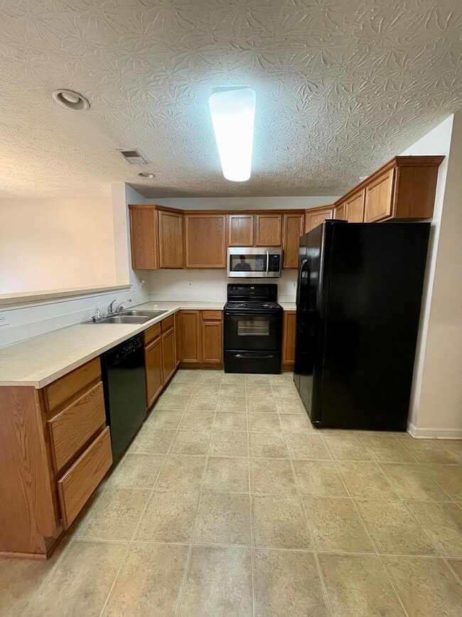 Building Photo - Lovely, Upscale Home! All Electric, Garage, Fenced Backyard; $1,900/Mo with 2 Yr Lease!