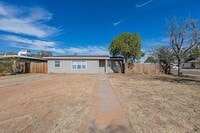 Building Photo - 3 bed 2 bath home with a carport in backyard