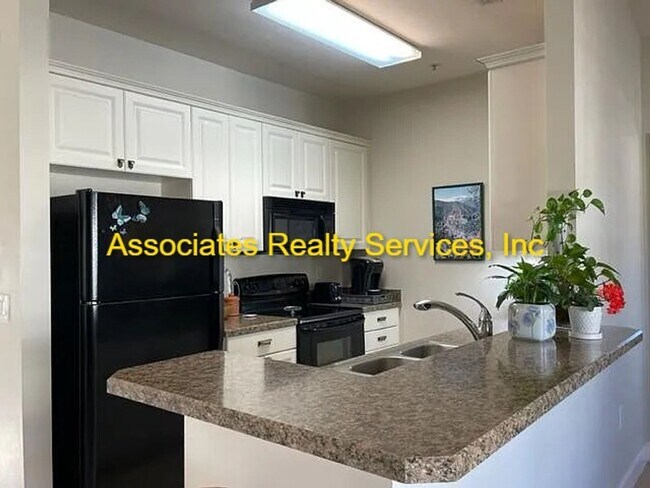 Building Photo - Live in Haile Market Square!  Now Available – 2nd Floor 3BR/2BA unit