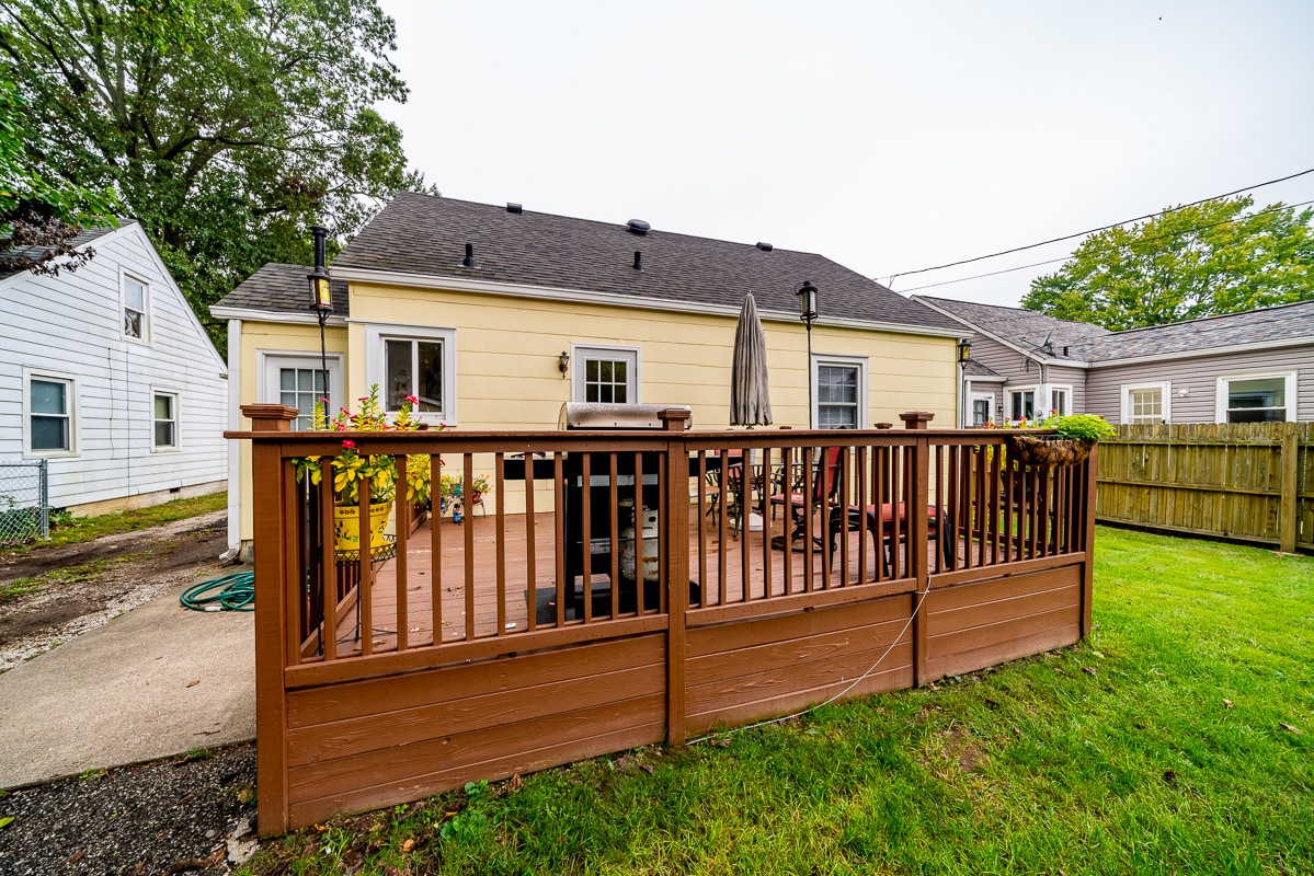 Large back-deck with steps to driveway and rear entrance to kitchen - 425 Virginia Ave
