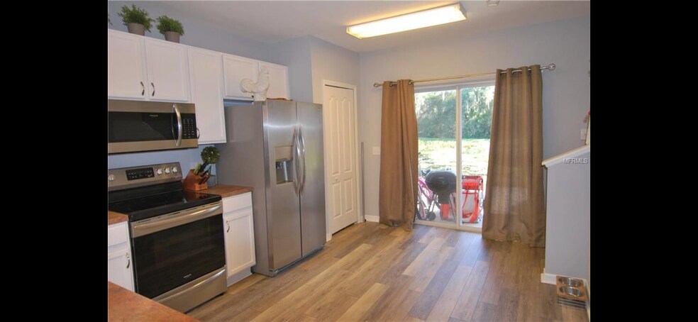 Building Photo - 5826 Fishhawk Ridge Dr
