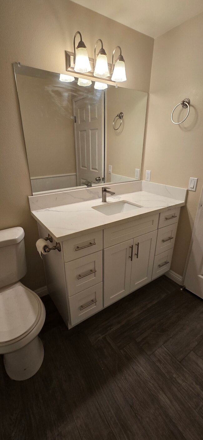 1st floor powder bathroom has been completely updated with new vanity, quartz countertop, new sink, - 14365 Foothill Blvd