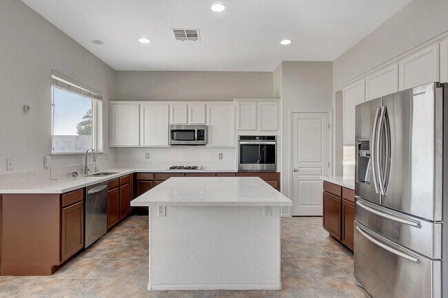 Kitchen island with full cooking range and refrigerator - 3034 Constable St