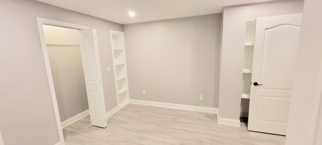 Building Photo - Stylish Basement Rental with Private Ameni...