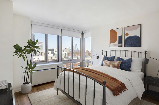 Updated Finishes bedroom with hard surface flooring - AVA Fort Greene