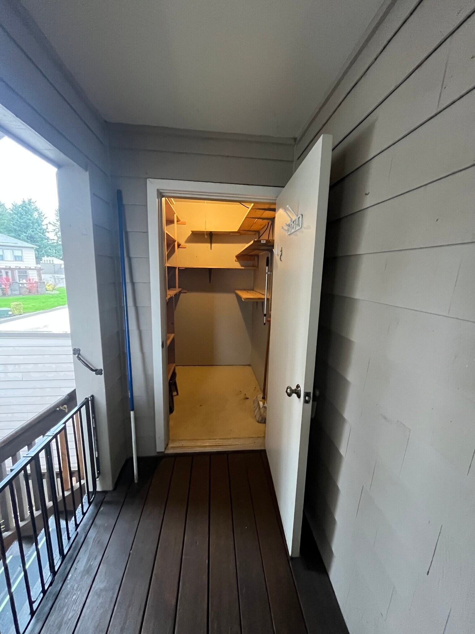 Outdoor storage unit across porch from front door - 7511 N Edgewater Ave