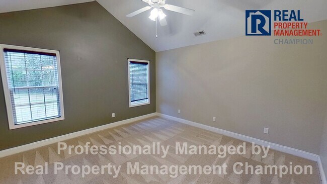 Building Photo - Beautiful home boasts open floorplan, screened porch, and spacious fenced yard