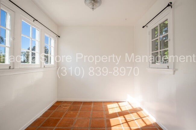 Building Photo - 8159 Willoughby Ave