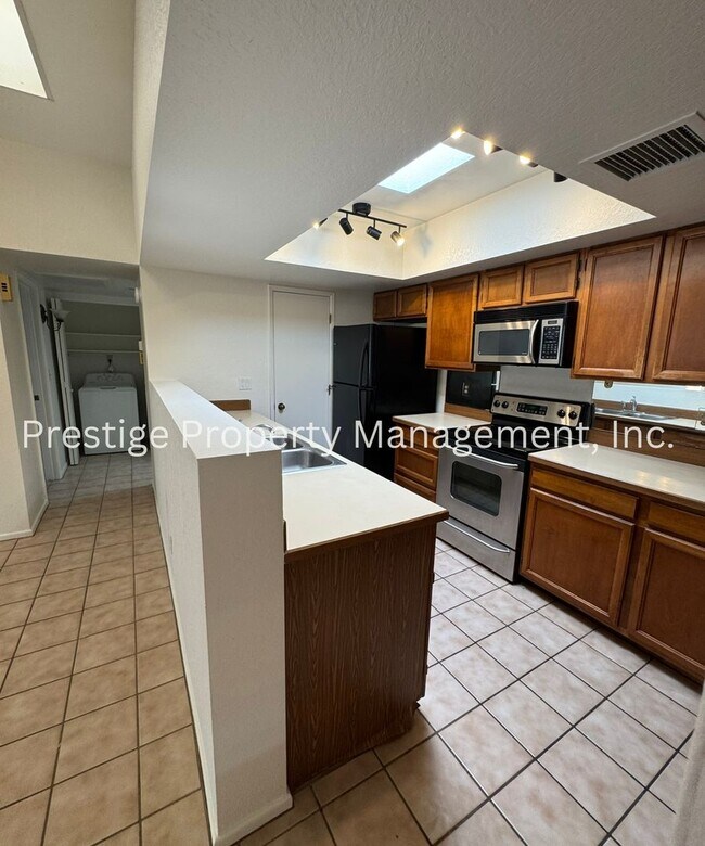 Building Photo - Totaling 3/3 With The Guest House; This Lovely Central Townhome is Everything You Need!